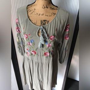 Long sleeve Forgotten Grace top with machine embroidered flowers. Cotton poly.